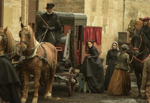 A la derecha, el guardadamas de la señora, a caballo