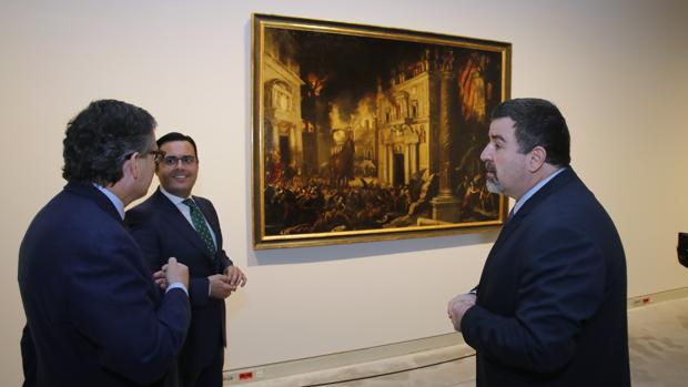 Úbeda de los Cobos, Roiz y Pérez Suescun junto a «El incendio de Troya», de Francisco Collantes